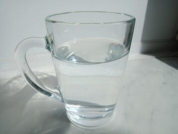 Alkotox dripped into a glass of water, the experience of using the product